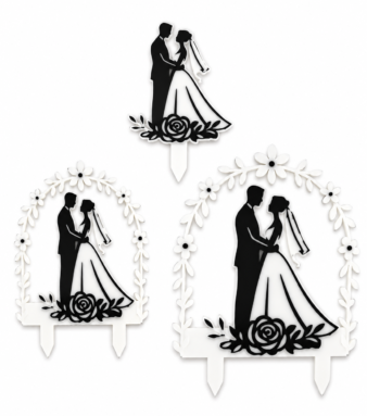 Wedding cake topper collection with couple silhouette and floral accents.