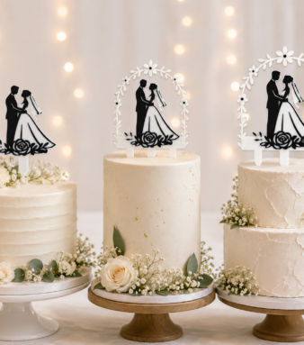 Wedding cake topper collection with couple silhouette design and floral accents.