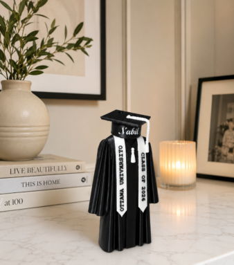 Personalized graduation figurine with custom name and university details, made in Dubai.