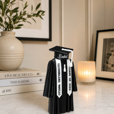 Personalized graduation figurine with custom name and university details, Dubai keepsake.