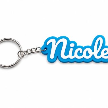 Personalized bold name keychain with blue outline and white lettering, Nicole example.