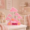 Forjolie pink Hello Baby cloud decor displayed in a nursery with stuffed animals