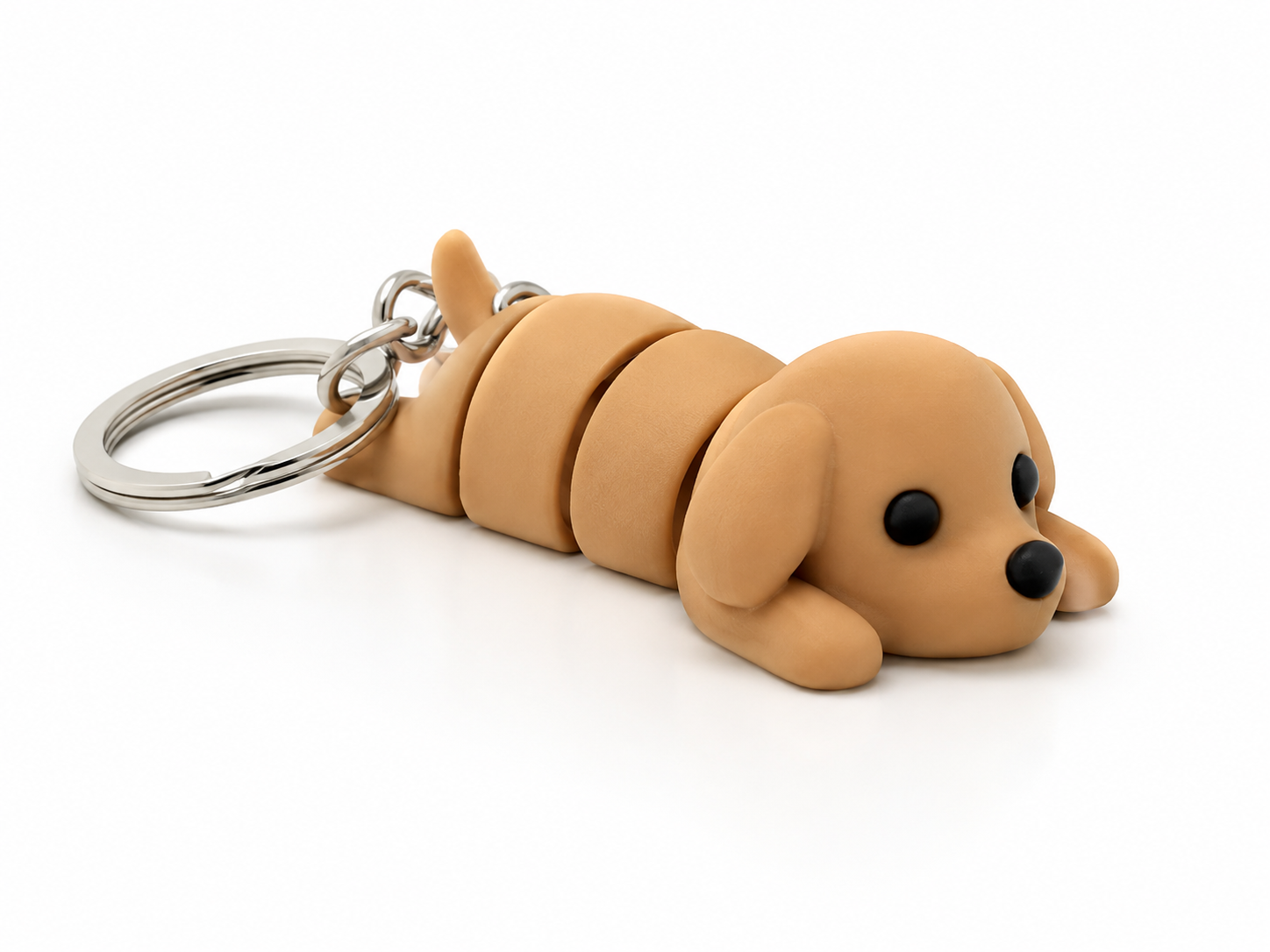 Flexi Puppy Keychain, 3D printed PLA articulated puppy keychain from Forjolie, Dubai.