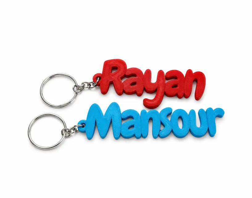 Personalized keychain with names Rayan and Mansour, Forjolie.dxb custom gifts in Dubai.