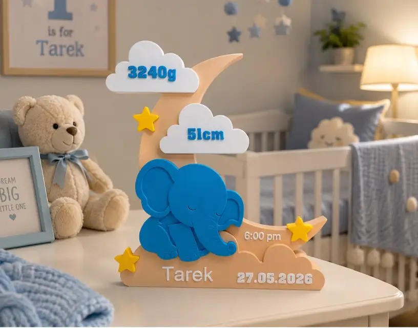 Personalized baby birth sign with moon and elephant design, showcasing weight and time details.