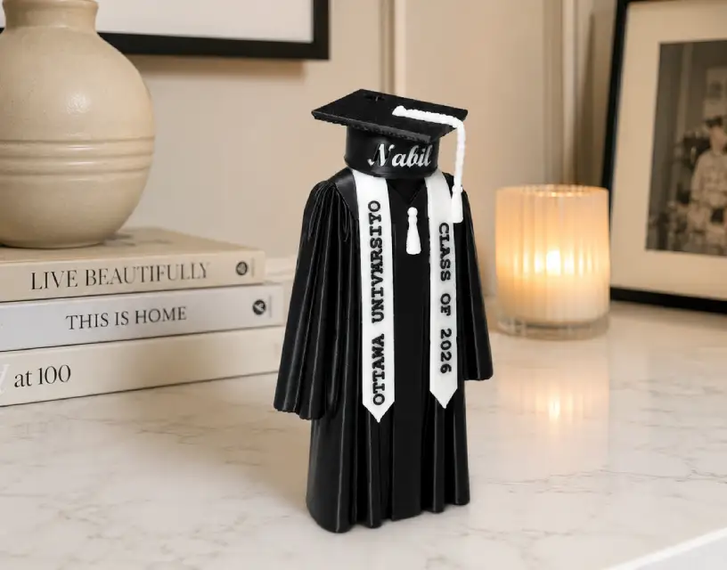Personalized graduation figurine with name and university details, Forjolie.dxb keepsake gift.