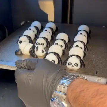 3D printed panda figurines, handcrafted in Dubai for personalized gifts.