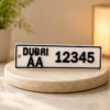 Forjolie personalized Dubai-style license plate keepsake reading AA 12345 on a wooden stand
