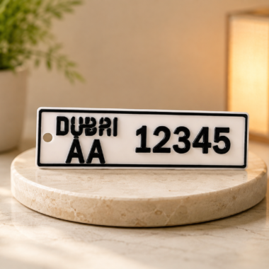 Dubai license plate keychain with customizable text and numbers.