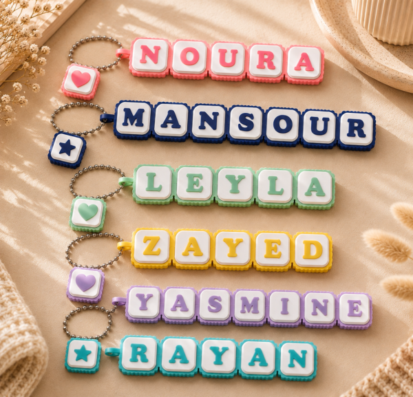 Personalized name keychain with colorful letter blocks, showcasing a custom gift option from Forjolie in